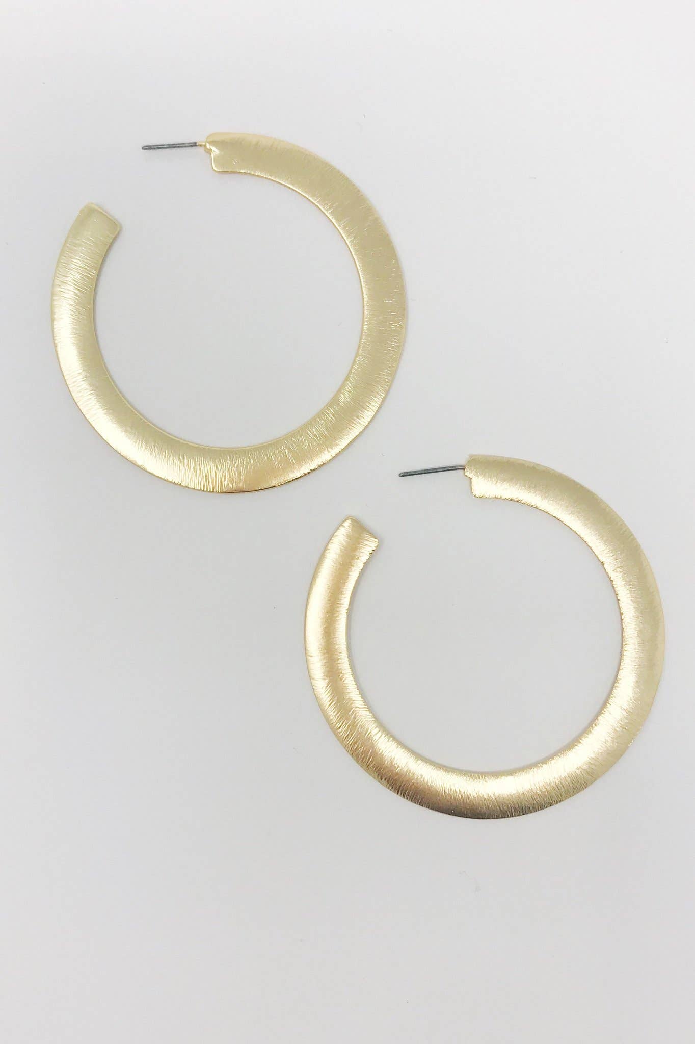 Alma Thick Flattened Metal Hoop Earrings: Gold