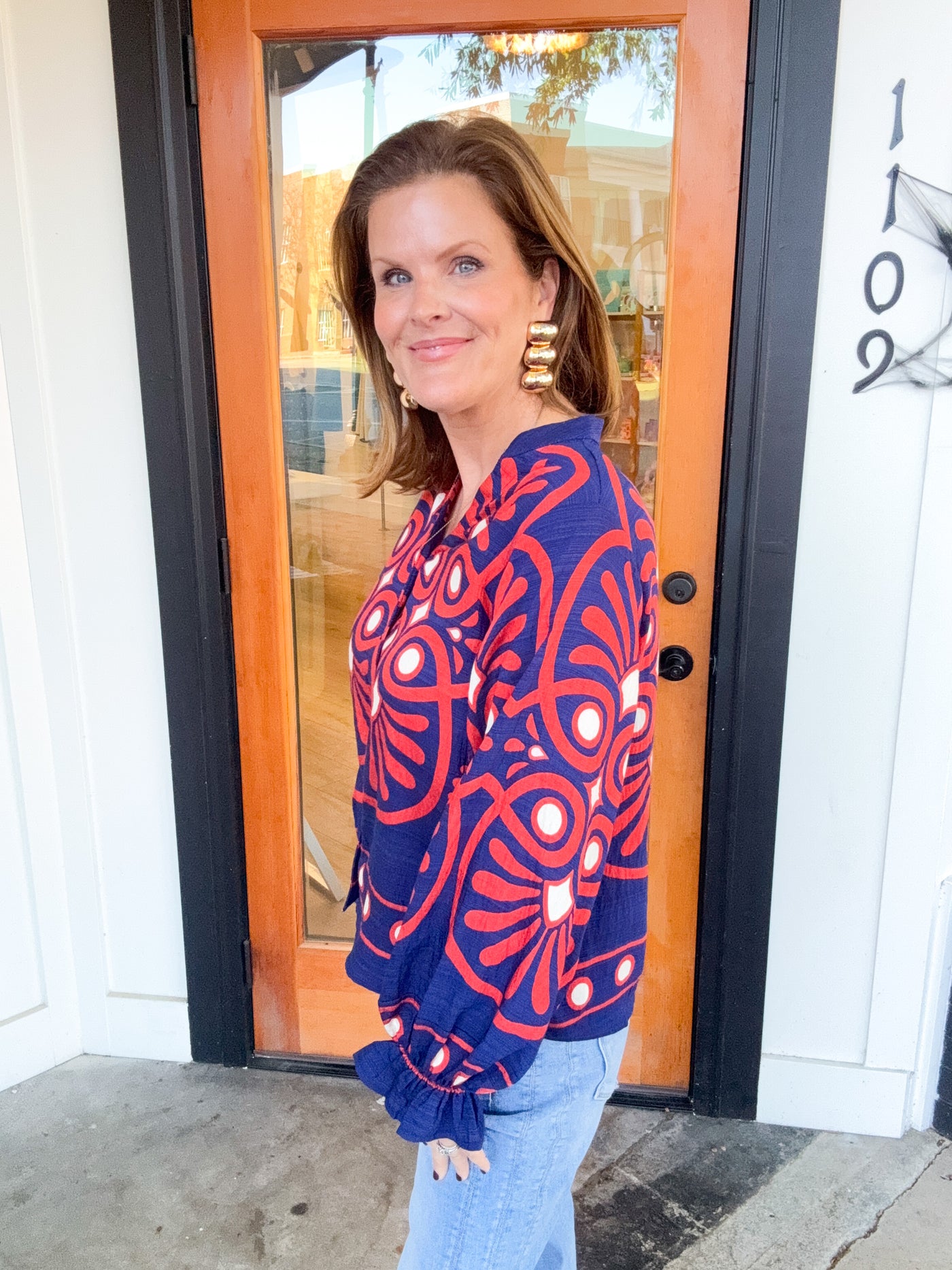 All I Need Geo Ruffle Trim Button Down Top