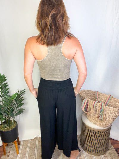 The One Acid Washed Racerback Bodysuit