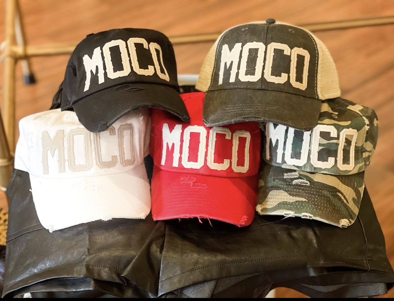 Top to Bottom L-R: Black Solid, Black Trucker, White Solid, Red Solid, Camo Solid